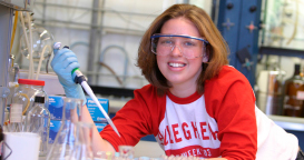 Photo of a student in a lab