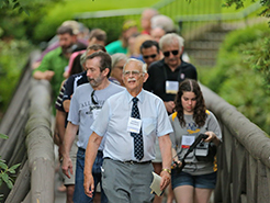 Photo of people walking on a bridge. Link to Learn More About Your Planning Option